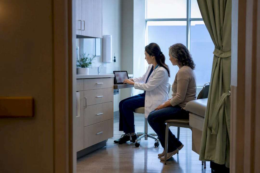 Clinician conducting an originating-site telehealth visit