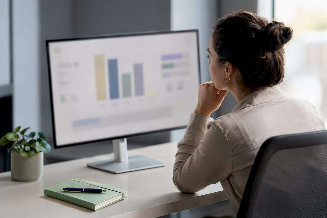 Analyst reviewing payer mix revenue dashboard
